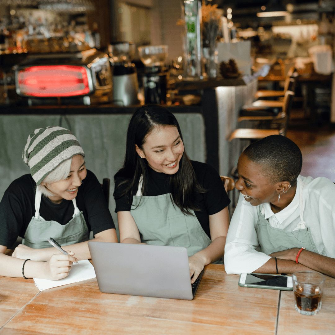Café owners in Sydney discussing how Precision Local’s expert SEO services help boost their business.